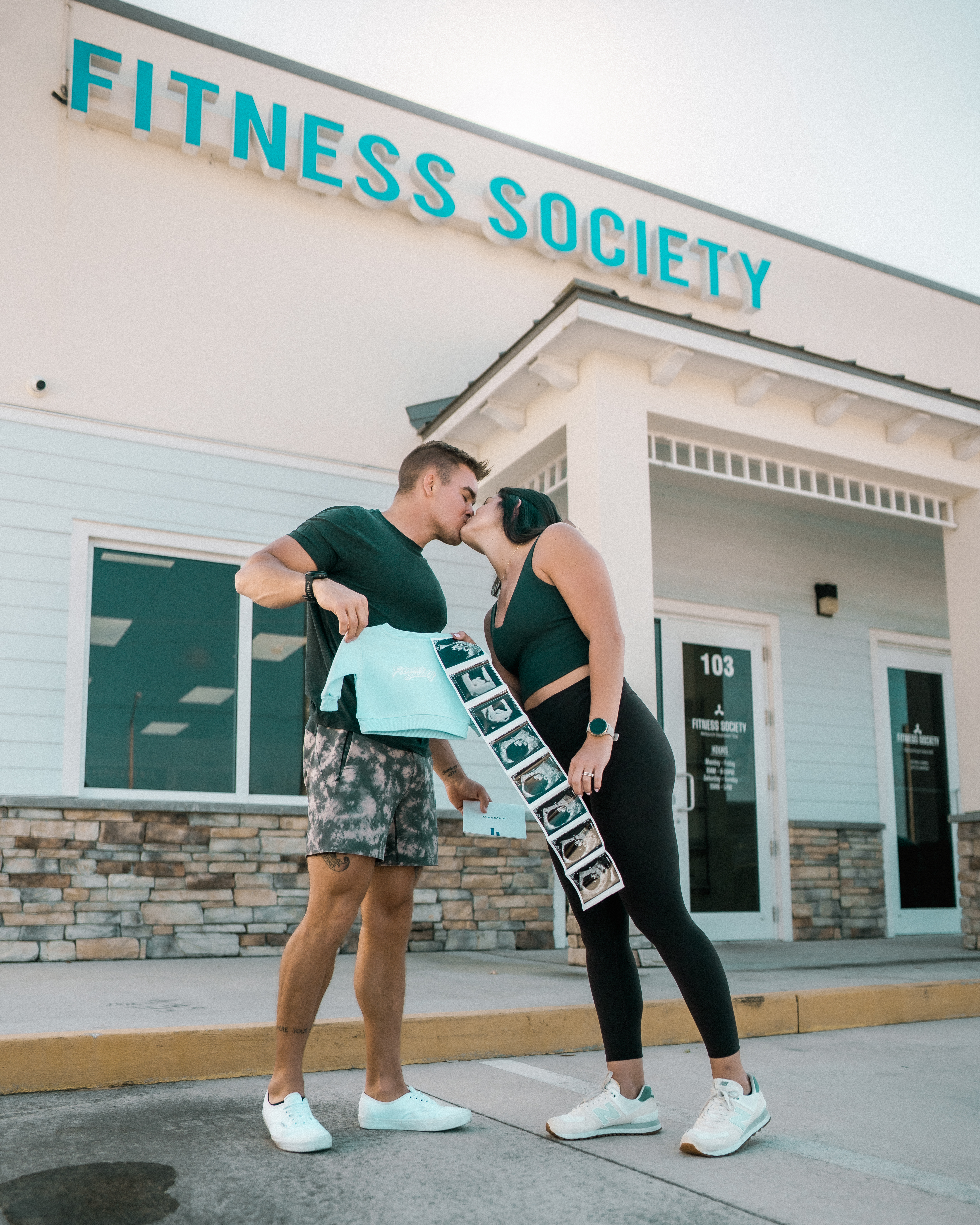 Connor Wigren and his partner in front of Fitness Society Supplements